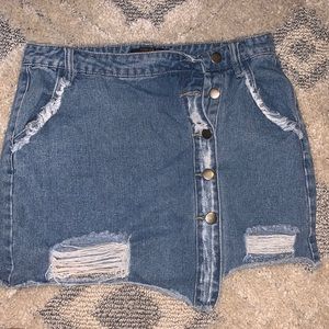 Denim skirt with cute asymmetrical button up design